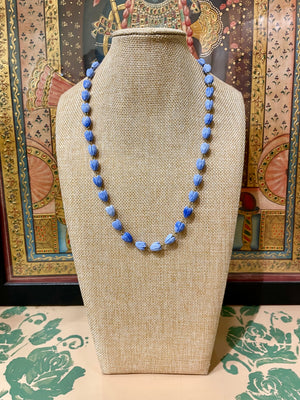 BLUE LOTUS CUT STRING NECKLACE
