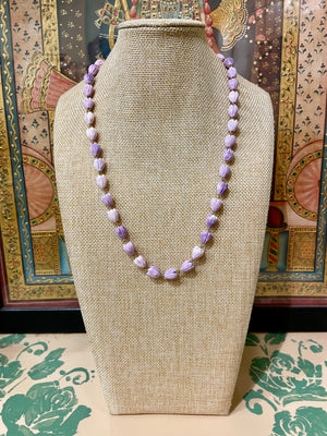 PURPLE LOTUS CUT STRING NECKLACE